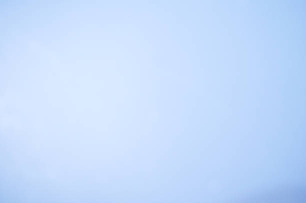 istock Horizontal image of an empty sky blue background. Light Bluish Color Abstracts and backgrounds of Glossy Plastic Paper Sheets Board design element copy space. 1330677448