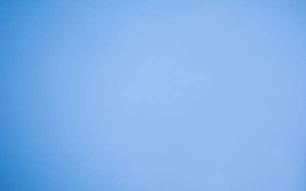 istock Horizontal image of an empty light blue background. Light Bluish Color Abstracts and backgrounds of Glossy Plastic Paper Sheets Board design element copy space. 1330677465