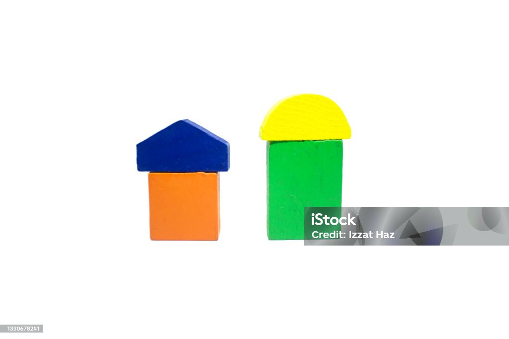 The wooden blocks of children's toys are arranged according to the order of the shape of something The wooden blocks of children's toys are arranged according to the order of the shape of two house Achievement Stock Photo
