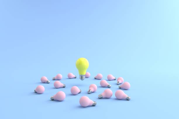 istock 3D rendering of The yellow energy-saving lamp is floating on a pink light bulb placed on a pastel blue floor. and the blue background. concept for new ideas and Outstanding idea, illustration. 1330680284