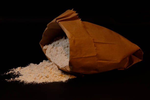 istock Wheat flour in brown paper packet, Organic flour, India 1330680462