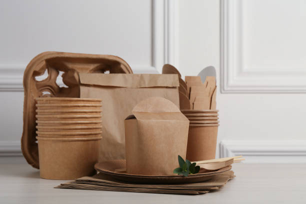 istock Disposable eco friendly products on white wooden table 1330685448
