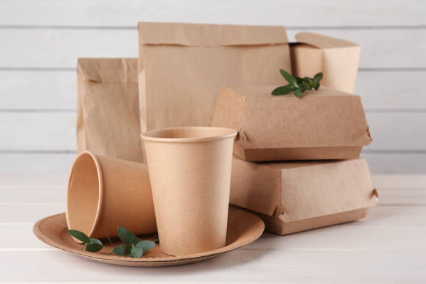 istock Disposable eco friendly products on white wooden table 1330686137