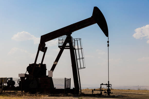 istock Oil field, oil pump in the work 1330687271