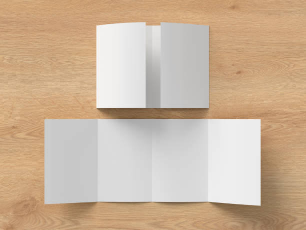 istock Vertical double gate fold brochure. Four panels, eight pages blank leaflet. Mock up on wooden background for presentation design. Unfolded and semi-folded. 1330688424