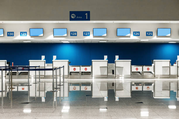 istock Airport check-in counters for background, no people 1330689373