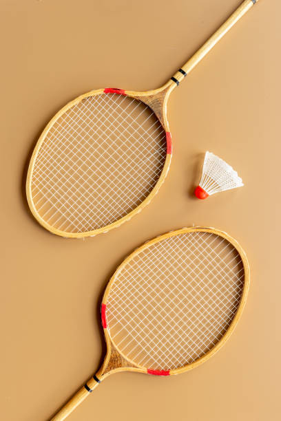 istock Two rackets and shuttlecock for playing badminton, top view 1330689730