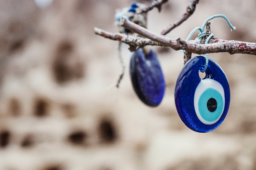 Turkish evil eye bead. blue colored amulet. superstition