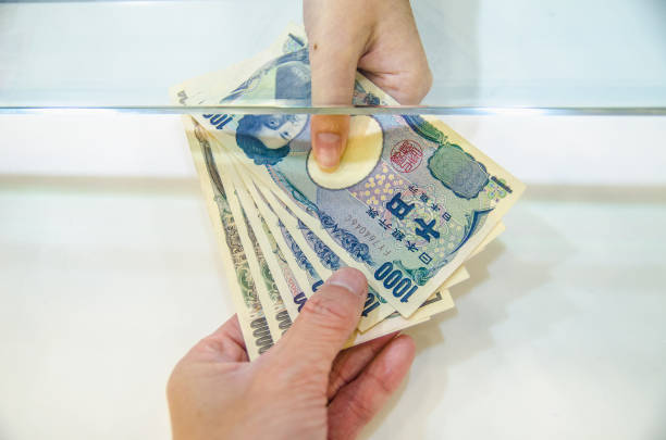 Exchange money for Japan money or Japanese yen. stock photo