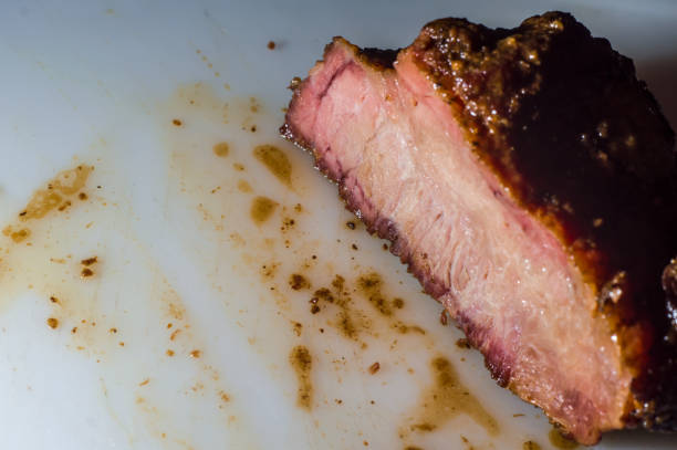 hump steak being sliced with copy space