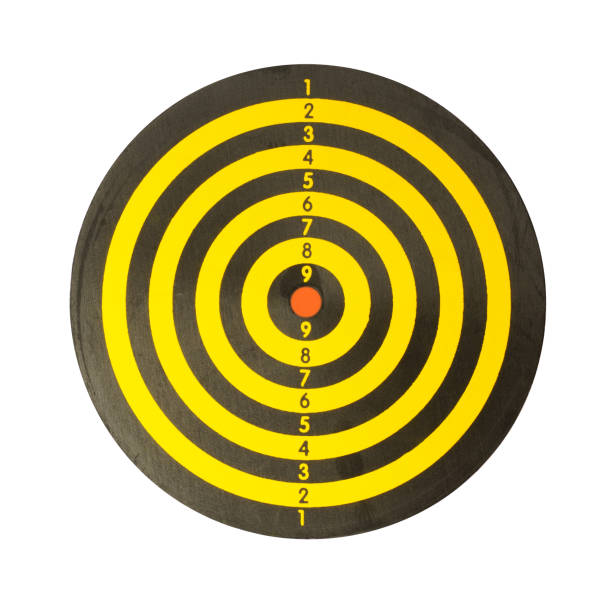 istock darts isolated on white background. black and yellow dart 1330695095