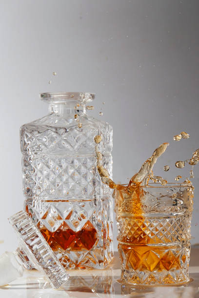 istock Alcoholic drink in a beautiful old glass and decanter 1330697975