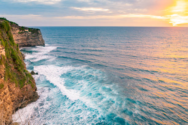 istock Bali, Sunset in Uluwatu. Blue ocean and cliffs. 1330698682