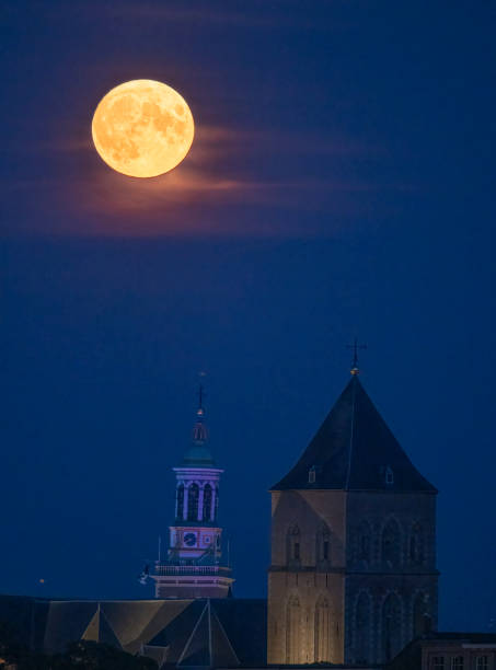 istock Full moon during a summer evening over the towers in Kampen 1330702016