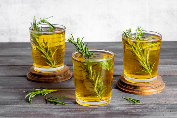 istock Fresh summer cocktail with cold tea and rosemary in glasses 1330706213