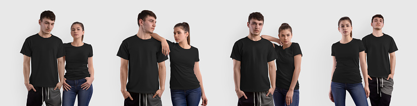 Mockup of a stylish black T-shirt on a couple, a girl, a guy, isolated on a background in the studio. Fashionable casual clothes template for design, print. Wear oversized set for store advertising