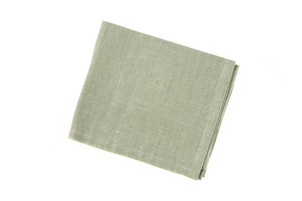 istock Green textile napkin isolated on white background. 1330708426