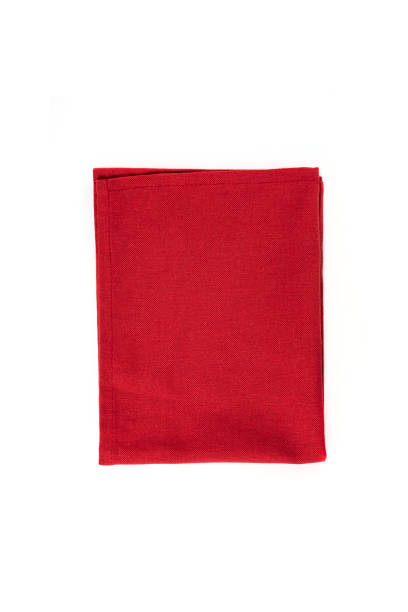 istock Red textile napkin isolated on white background. 1330708466
