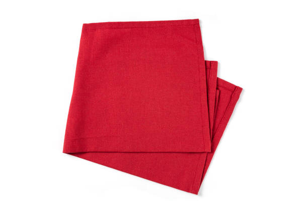 istock Red textile napkin isolated on white background. 1330708482