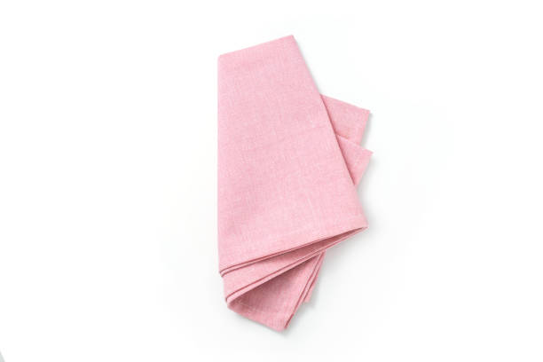 istock Pink textile napkin isolated on white background. 1330708525