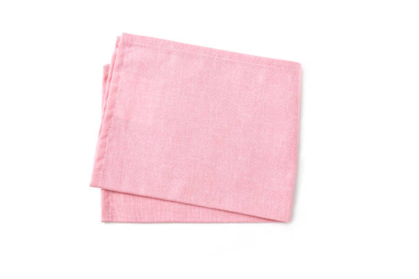 istock Pink textile napkin isolated on white background. 1330708561