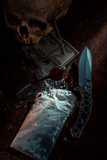 Cocaine Cocaine on rusted background. Drug smuggling concept. bloody money stock pictures, royalty-free photos & images