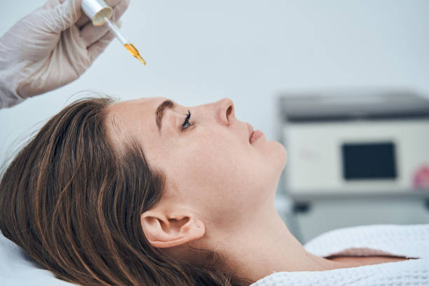 istock Thoughtful female person doing professional beauty procedure 1330709870