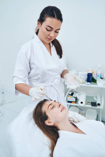 istock Young beauty specialist working in modern clinic 1330709951
