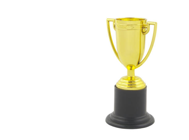 istock Golden trophy cup isolated on white with copy space 1330709974