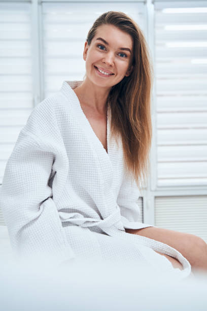 istock Pretty brunette woman feeling happiness after massage 1330710058