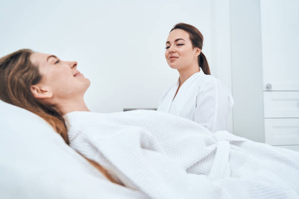 istock Positive delighted female person lying on couch 1330710165