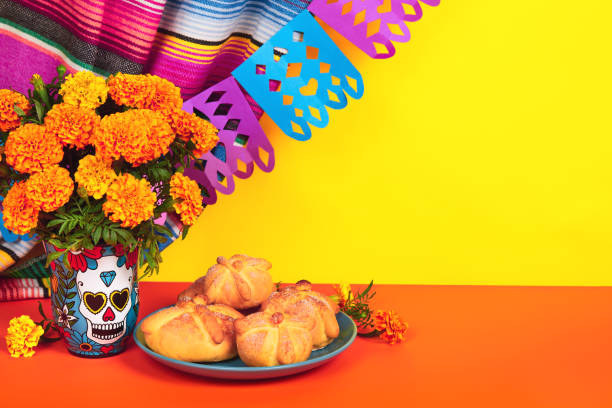 Day of the dead, Dia De Los Muertos Celebration Background Day of the dead, Dia De Los Muertos Celebration Background With Skull, calaverita vase, marigolds or cempasuchil flowers, bread of death or Pan de Muerto with Copy Space. Traditional Mexican culture religious offering stock pictures, royalty-free photos & images