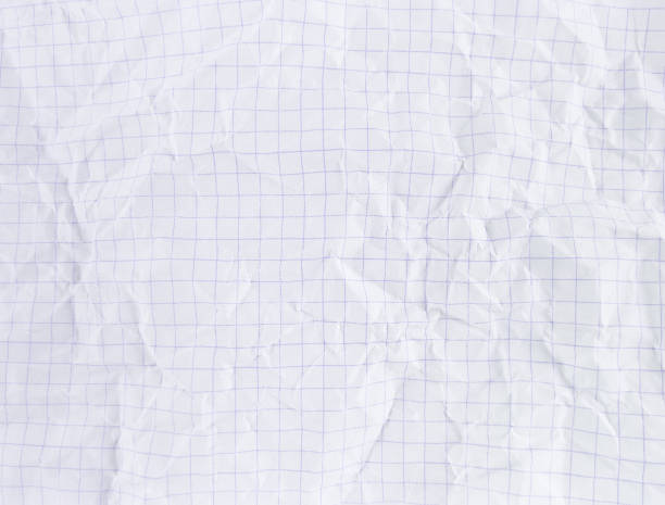 istock Crumpled white sectional paper sheet textured with empty space. 1330711617