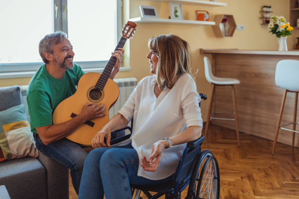 istock Mature Couple Having Fun while Playing a Guitar 1330715059