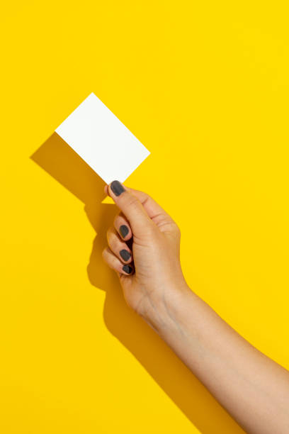 istock Hand holding blank business card 1330715120
