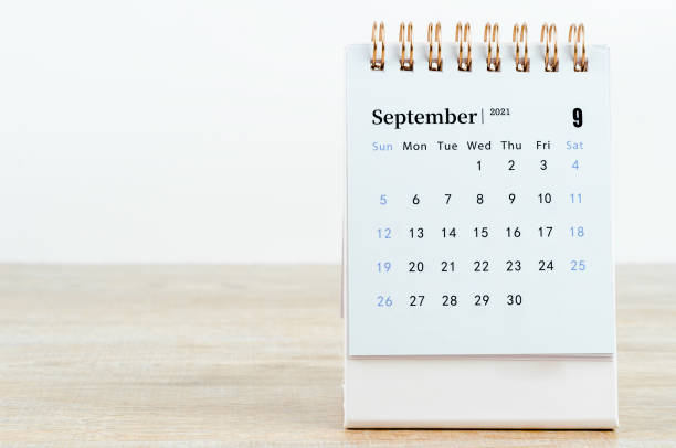 September Calendar 2021 September Calendar 2021 on wooden table background. september calendar stock pictures, royalty-free photos & images