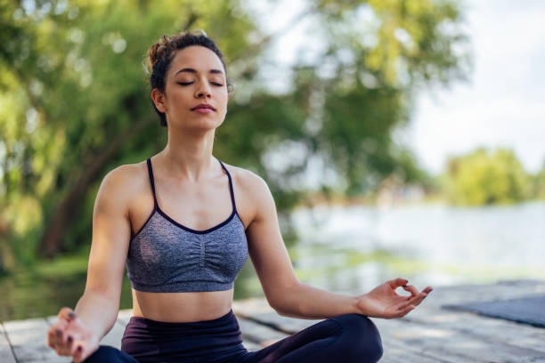 istock Young woman, enjoying her meditation. 1330723477