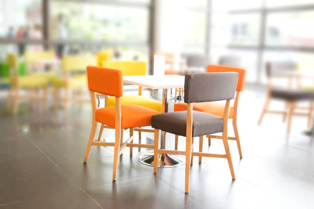 istock Dining area with colorful tables and chairs 1330725505