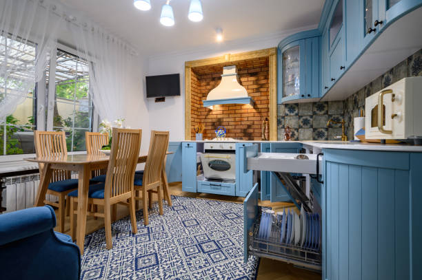 istock Modern classic luxurious kitchen and dining room, drawers and doors open 1330727054
