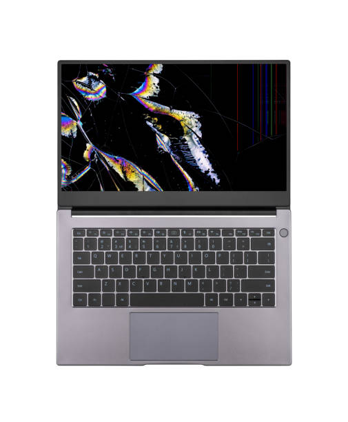 istock open laptop with a broken screen in color spots and cracks isolated on white background close up top view 1330727777