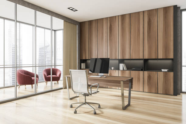 istock Luxury CEO office and lounge area with table, computer and bookcase 1330728700