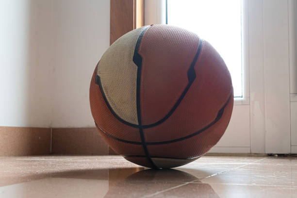 istock Basketball next to a house door 1330728959