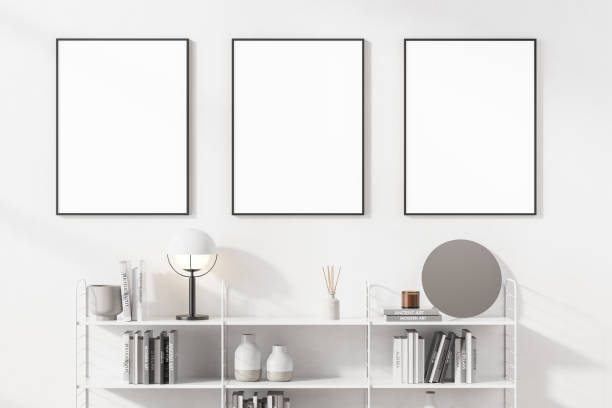 istock White living room with bookshelves and three posters 1330730606