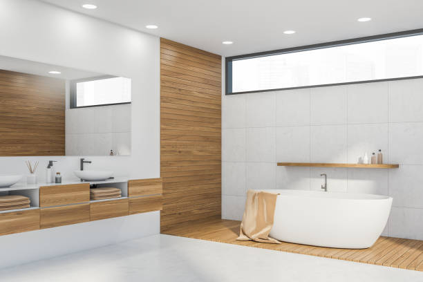 istock Corner of white bathroom with narrow window 1330731439