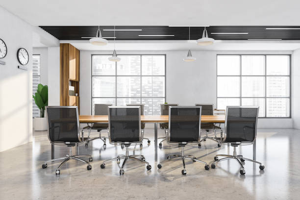 istock Office table with chairs in the interior with wooden design elements 1330732736