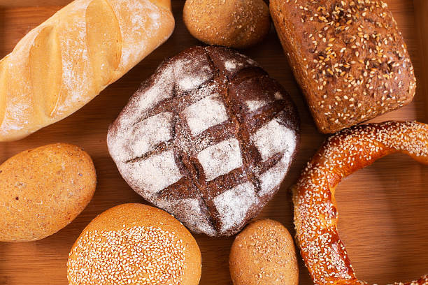 istock Different kinds of fresh bread on a tray. 1330732809