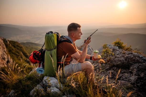istock Meeting dawn on top of the mountain 1330732829