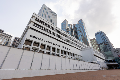 Hong Kong - July 26, 2021 : General view of General Post Office in Central, Hong Kong. The General Post Office, opened in 1976, is set to be demolished to make way for the Central harbour front redevelopment.
