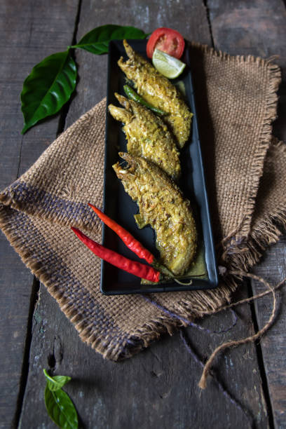 istock Cooked pabda fish in mustard sauce 1330734820