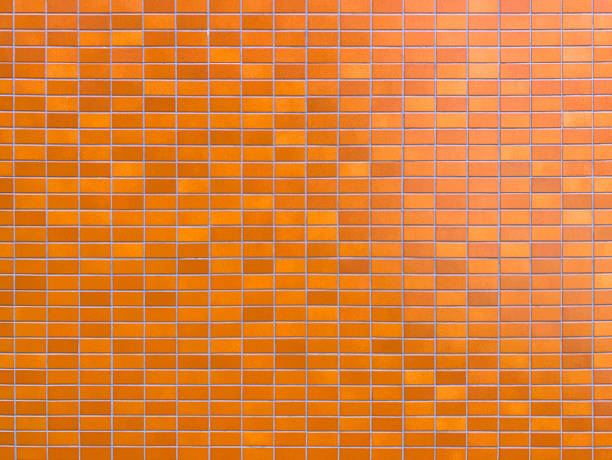 istock Texture of orange brick wall of building 1330738447
